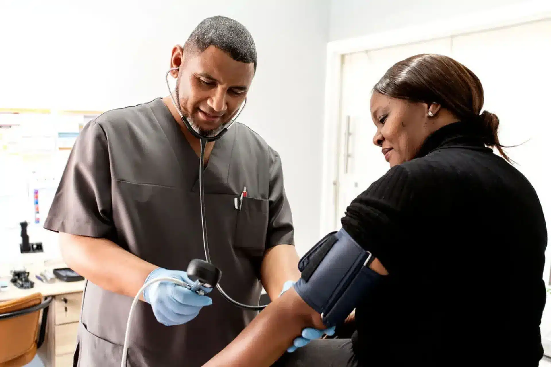 dr-ortel-checking-patient-blood-pressure